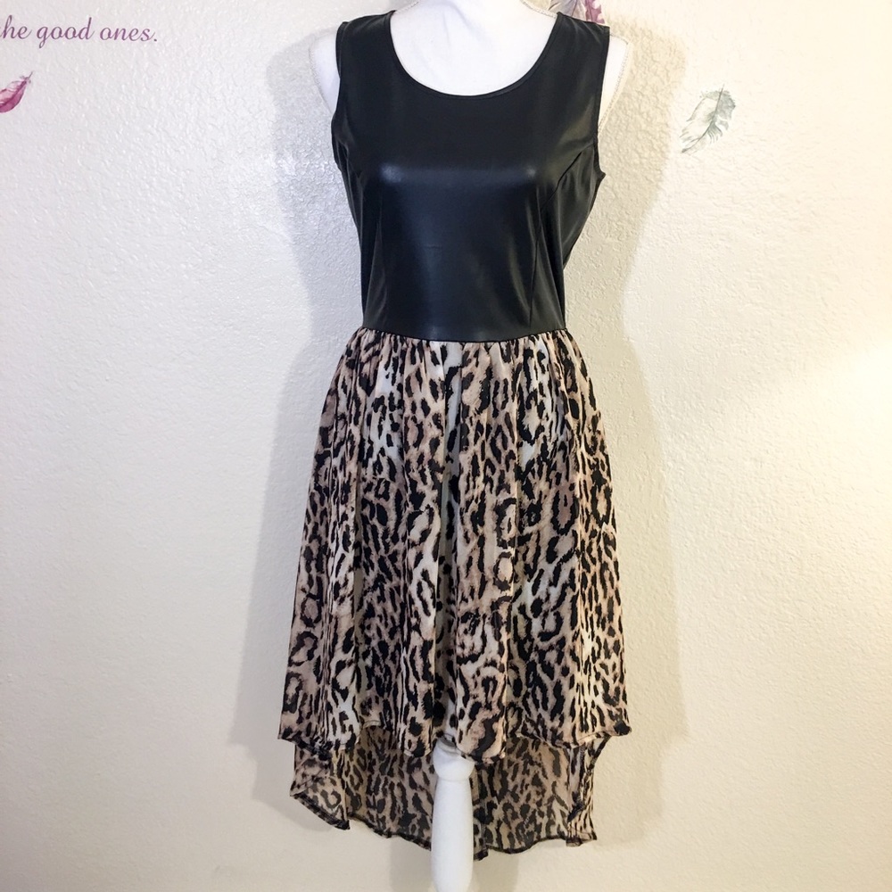 Almost famous black/ leopard print dress.